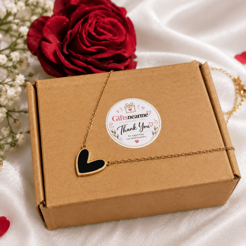 Black heart necklace displayed on a Giftsnearme gift box