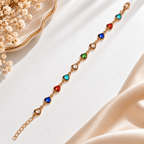 Full-length view of the gold-tone Rainbow Heart Bracelet with multicolour heart stones and extension chain