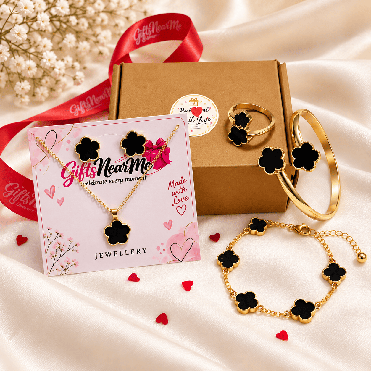 black-clover-jewellery-set-with-necklace-earrings-ring-cuff Black Clover Jewellery Set with necklace, earrings, ring, cuff bangle and chain bracelet in a gold-tone finish